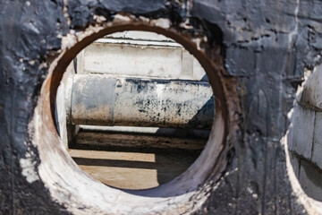 Laying of underground pipes in concrete chamber. Installation of water main at the construction site. Construction of stormwater pits, sewerage valve, sanitary system and pump station.
