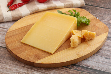 Parmesan hard cheese with small pieces