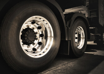 Rear of Semi Truck Wheels Tires. Chrome Wheels. Freight Trucks Transport.	