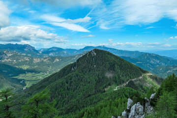 Panoramic view on mount Goli Vrh in Kamnik Savinja Alps and mountain peaks of Karawanks in Carinthia, border Austria and Slovenia. Mountaineering. Freedom wanderlust hiking concept. Bad Eisenkappel
