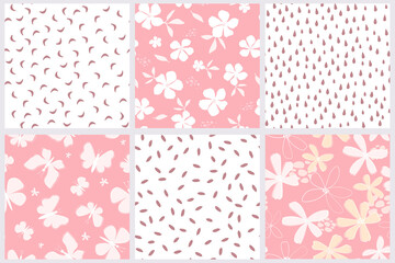 A set of seamless patterns with flowers, butterflies, leaves, raindrops. Natural spring and summer abstract print. Vector graphics.
