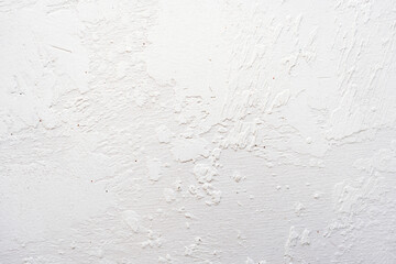 artistic plaster on a gray and white wall. Repairs. elements of wall decor. copy space. texture. background.