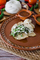 Mexican quesadillas with cheese and salsa sauce traditional food in Mexico