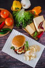 mexican burger with chips and avocado on table food with ingredients in Mexico
