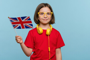 Child holding UK flag.