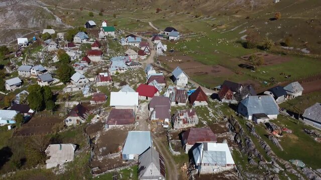 Aerial drone view of mountain village Lukomir in Bosnia and Herzegovina. Unique and traditional village. Unique village in Europe. Medieval traditional way of living. Rural tourism and holidays. 
