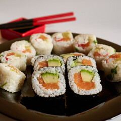 Bright sushi on a white background