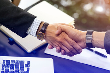 Greeting of  Business people shaking hands in the office