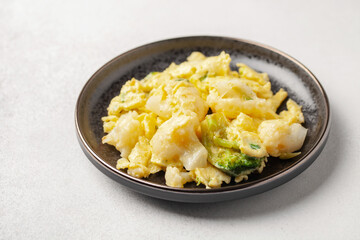 Broccoli and cauliflower baked with egg in a plate on the table. Diet nutrition