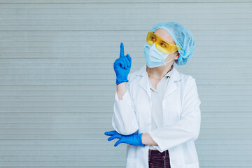 Scientist in uniform holding beaker and test tube have chemical liquid for testing chemical reaction.