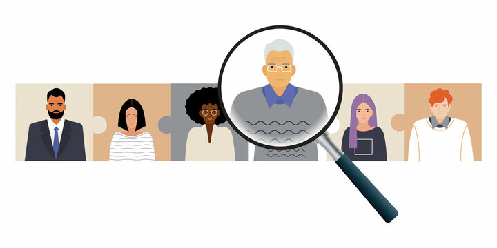 elderly worker under a magnifying glass