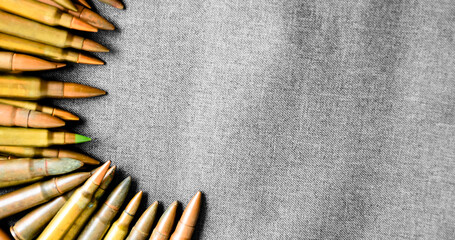 Ammo, ammunition on dark background, top view, soft and selective focus.