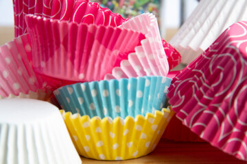 Birthday Cupcake Liners in Pink, Blue and Yellow in Close Up Shot