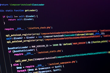 The software developer does the php coding. The programmer is doing web backend code. With selective focus