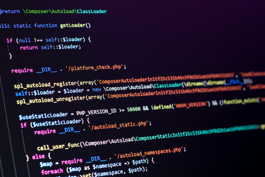 The software developer does the php coding. The programmer is doing web backend code. With selective focus