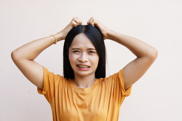Fototapeta premium Asian women mark hands in crosses.