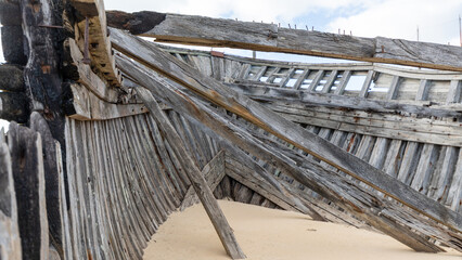 Carcass of boats in a boat cemetery in Brittany in France in February 2022