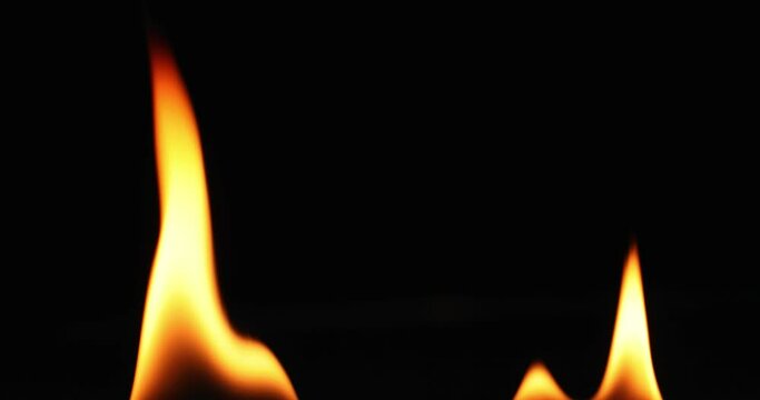 Fire Flames Looped Torch Ignited Burning. Real Flames Ignited On A Black Background. Real Fire.