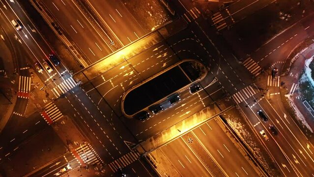 Aerial view of the road intersection on the DTŚ Highway in Katowice - Day to night transition. Silesia, Poland.
