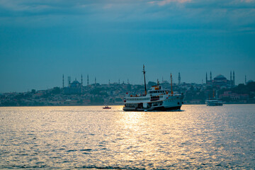 Istanbul and ferry. Cityscape of Istanbul from Kadikoy district