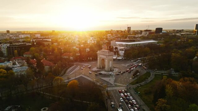 Arch of Triumph Bucharest, Romania Arcul de Triumf București. Sunset shot, golden hour, drone shot 4k