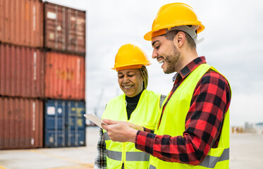 Industrial engineers working in logistic terminal of container cargo