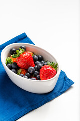 bowl of strawberries and blueberries for 4th July table American independence commemorative dish