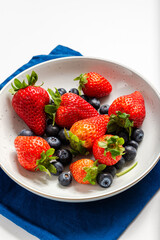 plate of strawberries and blueberries for 4th July table American independence commemorative dish