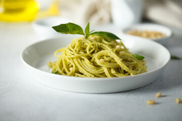 Traditional spaghetti with pesto sauce