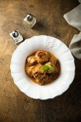 Homemade meatballs in a white bowl