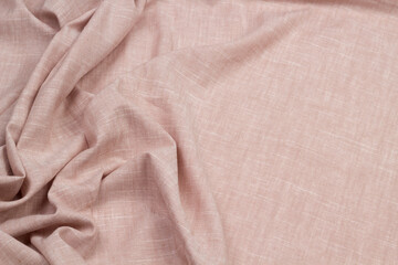 Fototapeta premium Texture of the fabric swirling in a whirlpool. cloth background. Web article template. Long header banner format. Sale coupon. Visit card. Your information. Text space.