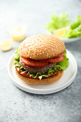 Traditional homemade burger with fresh tomato