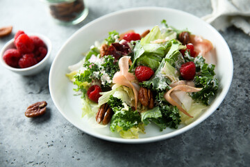 Leaf salad with jamon and raspberry