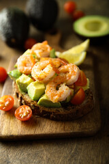Shrimp toast with tomato and avocado