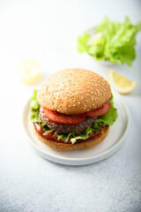 Traditional homemade burger with fresh tomato