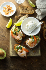 Roasted shrimps with cream cheese on toast