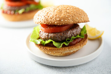Traditional homemade burger with fresh tomato