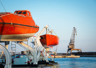  Lifeboat secured to large ship in the port of Rijeka,Croatia