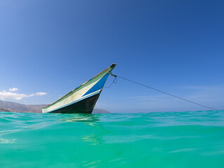 Fishing boat moored off the coast of Socotra. Socotra, Yemen.