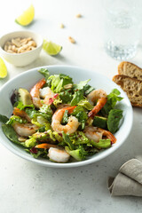 Healthy green salad with shrimps and avocado