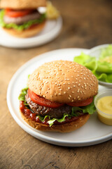 Traditional homemade burger with fresh tomato