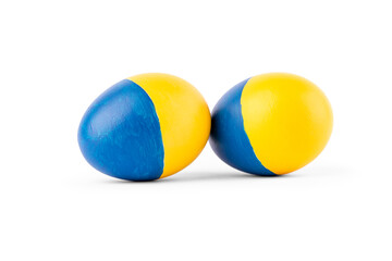 Easter egg blue and yellow on Ukraine flag colors as concept for war Ukraine