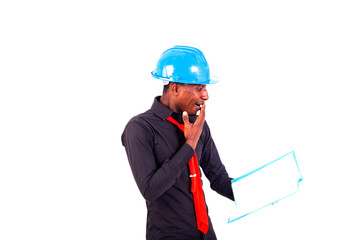 young surprised engineer man reading document.