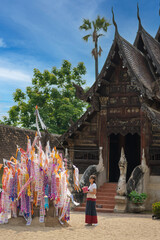 Asian Buddhist women pray, and make merit at Wat Ton Kain temple is the old wooden temple a famous...