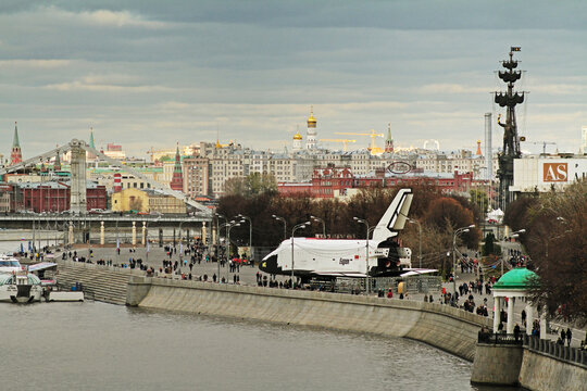 Moscow, Russia - October 26, 2013: Copy of the Soviet space shuttle Buran in the park Gorkogo in Moscow. View of Gorky Park and the city from the Pushkin Bridge