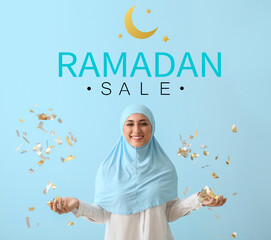 Young Muslim woman with confetti and text RAMADAN SALE on light blue background