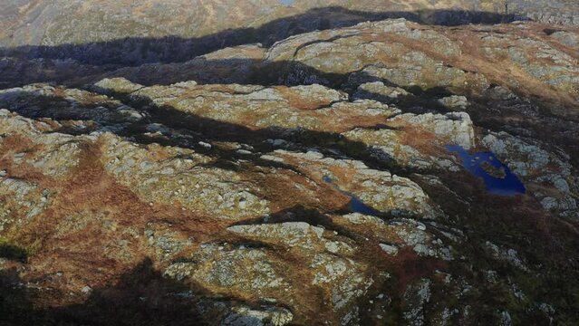 Slow High And Smooth Rocky Terrain Aerial Background