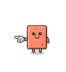 brick cartoon with pointing left gesture