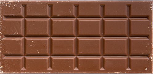 close-up of milk chocolate bar with rice crisps. top view
