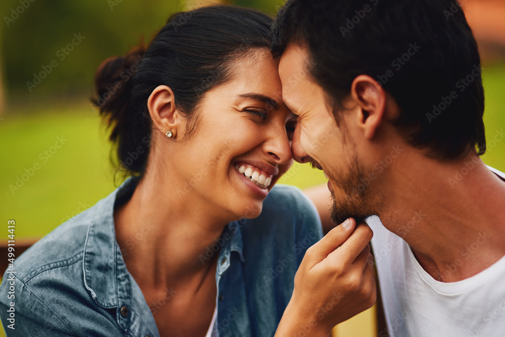 Poster my heart was made to love you. shot of an affectionate young couple spending a romantic day in the p